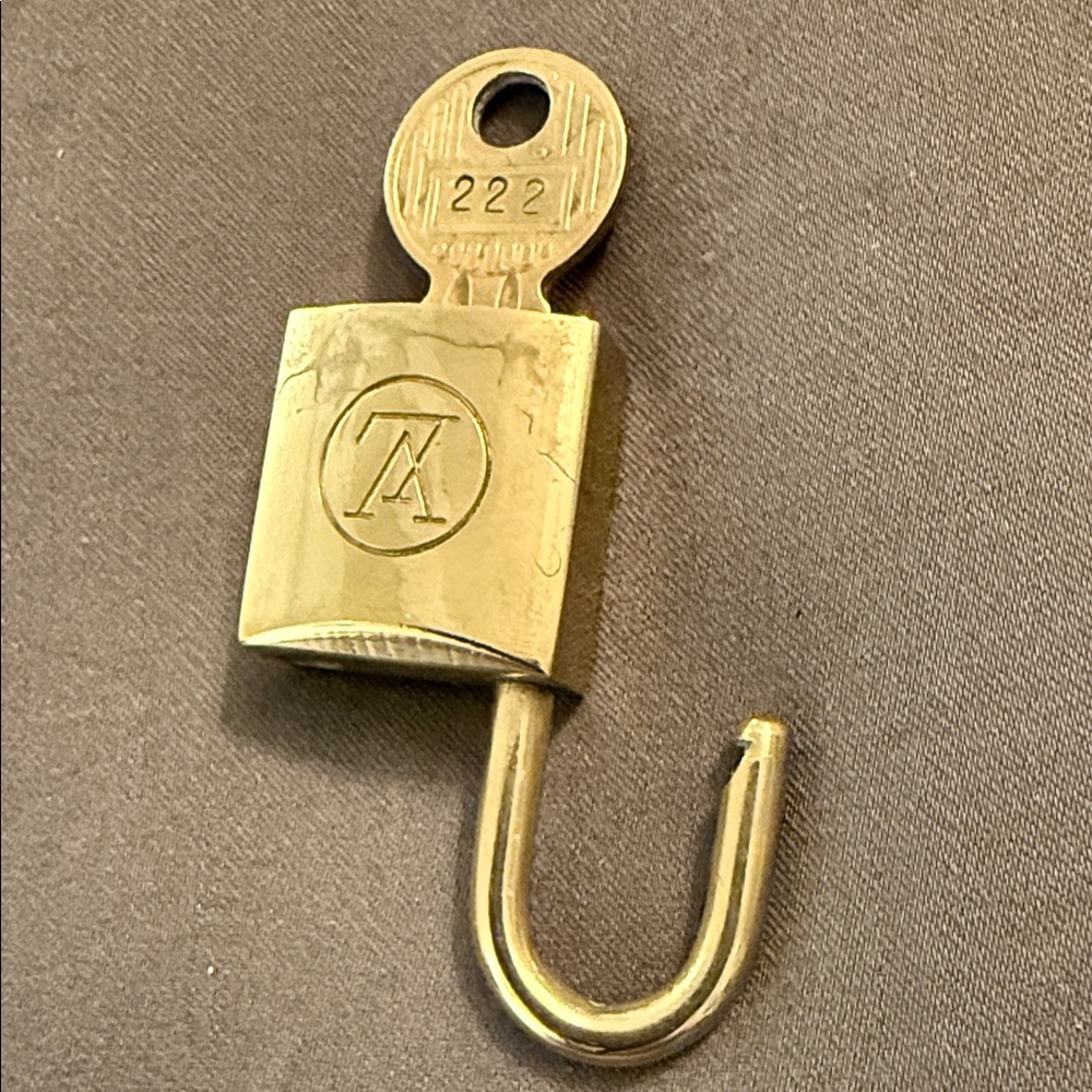 Louis Vuitton Gold Lock with Key. Rare number 222